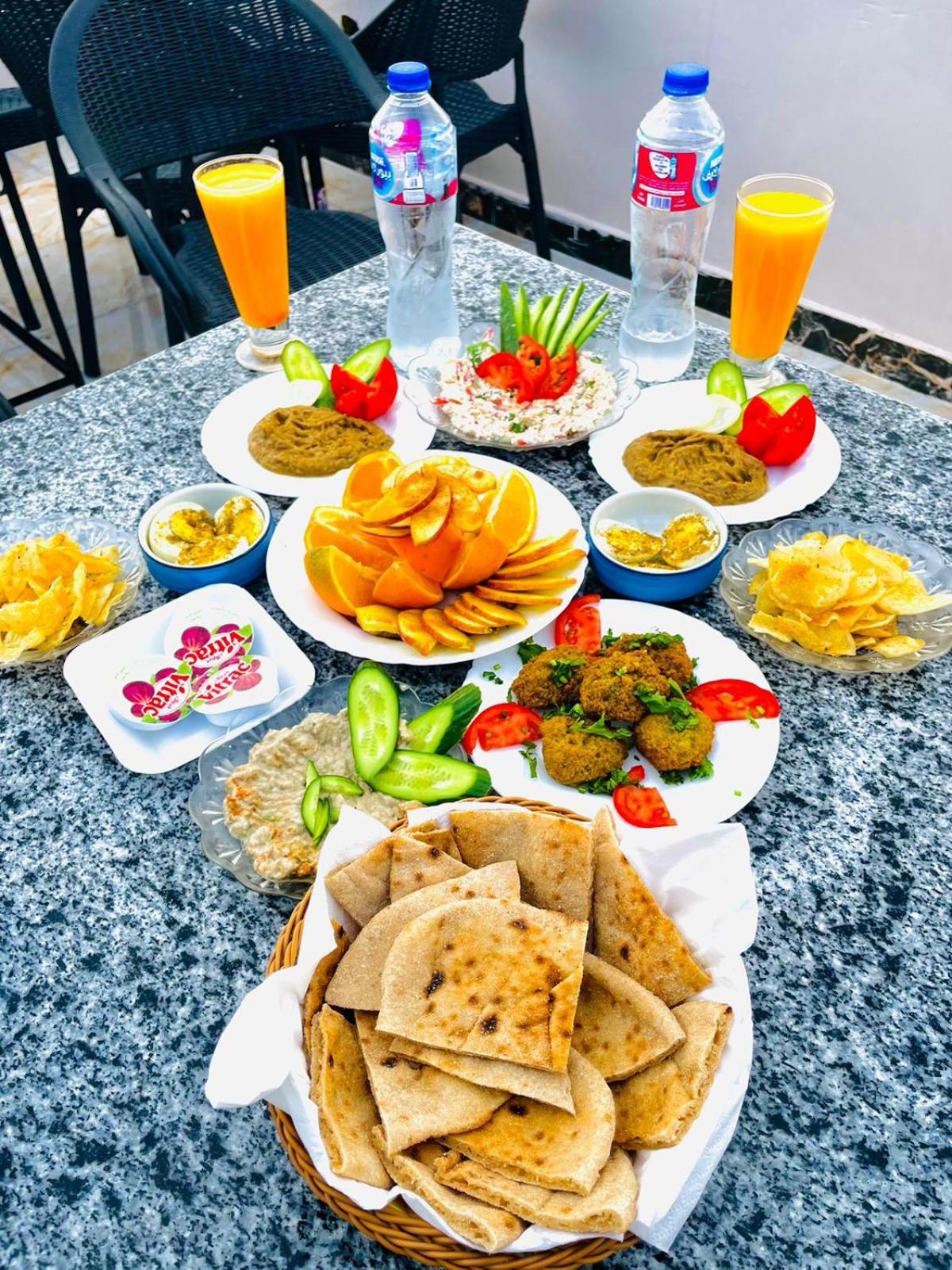 Momen Pyramids Inn Kafret el-Gabal Exteriér fotografie